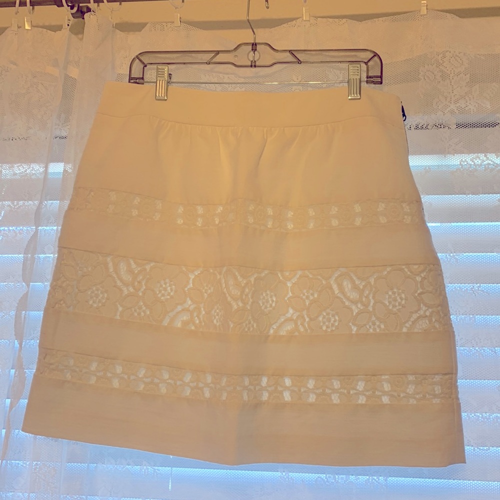 White lace skirt. Really cute on. Like new.